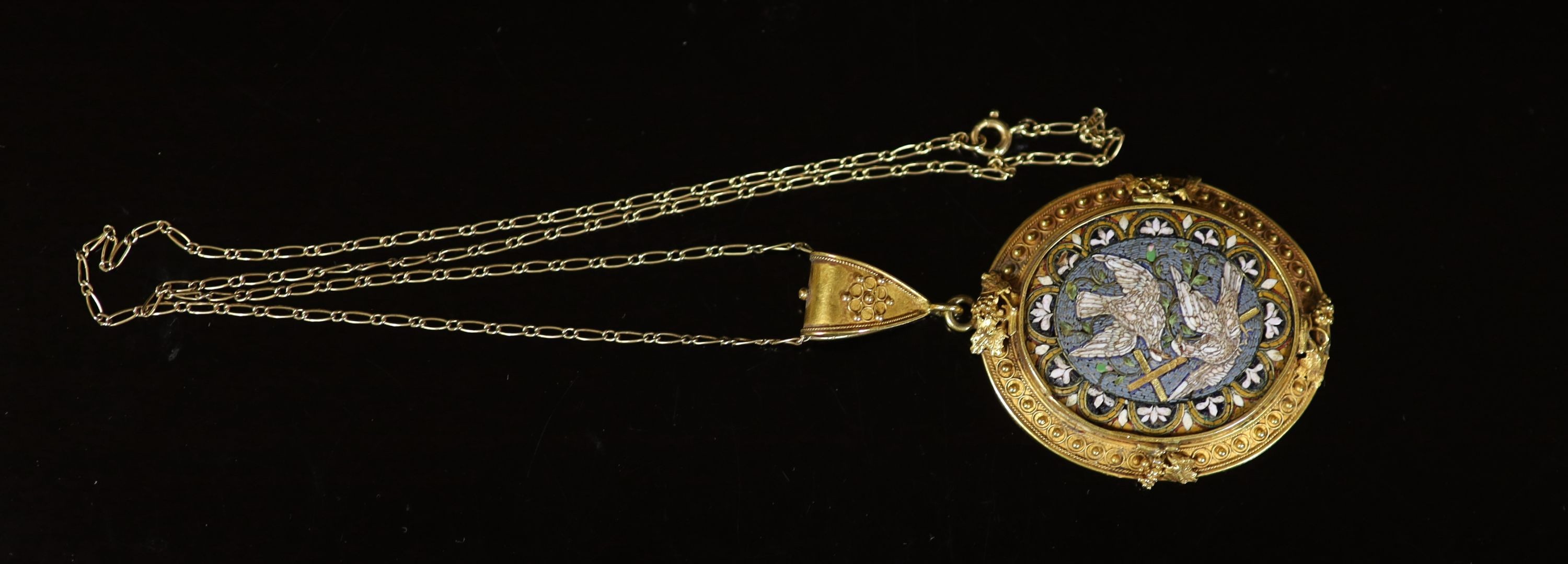 A 19th century gold and micro mosaic set oval pendant, decorated with Doves of Peace